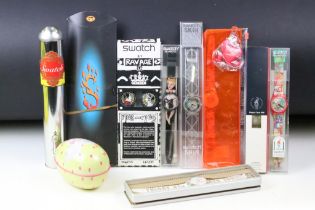 A collection of ten cased Swatch watches to include 1996 Atlanta Olympics, Ravage, Skin, Eggs