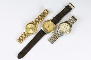 A collection of three gents Seiko wristwatches to include Quartz and Kinetic examples.