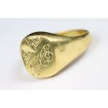A gents hallmarked 18ct gold signet ring.