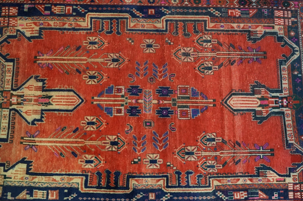 Persian Wool Rug, the red ground with a geometric pattern within a border, 238cm x 160cm - Image 2 of 7