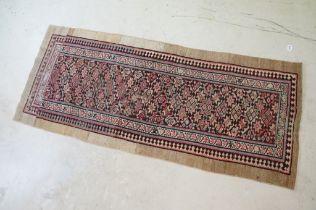 Serab Runner with diamond lozenge and flowerhead field within a camel outer border, cut and reduced,