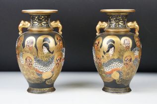 Pair of early 20th century Japanese Satsuma ' Thousand Faces ' vases, of baluster form, twin-handed,