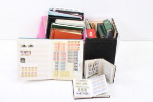 Collection of British stamps, first day covers & presentation packs, mostly contained within various