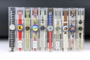 A collection of ten cased Quartz Swatch watches to include 1996 Atlanta Olympics and 100 Years of