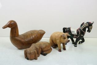 Four carved wooden animals to include a large duck (approx 40cm high), folk art horse, seated pig