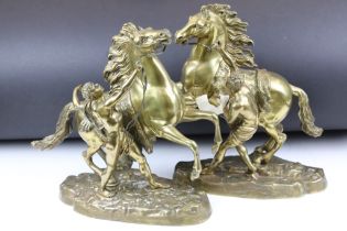 After Guillaume Coustou (1677-1746) - A Pair of Bronze Marly Horses, of traditional form on shaped