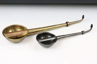 Two 19th Century Victorian extendable ear trumpets. One marked made in English. Measures 44cm and