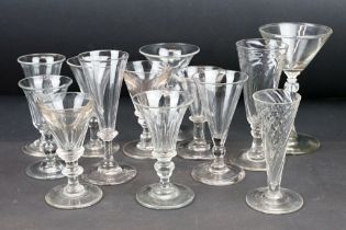 Collection of 13 drinking glasses, mostly 19th century examples, featuring faceted examples with