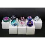 Eight Caithness paperweights to include Flower in the Rain, QEII Accession to the Throne, Whirlwind,
