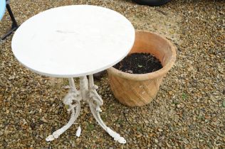 Cast metal painted patio table (approx 70cm high), together with a terracotta plant pot with lattice