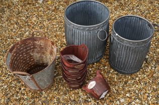 Two galvanised metal planters of ribbed form, twin-handled (largest approx 49cm high), together with