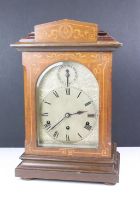 Early 20th century inlaid mahogany Westminster chiming mantel clock, the engraved arched dial with