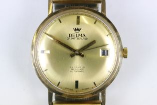 A vintage gents 9ct gold cased Delma 25 jewel wristwatch with date function to 3 o'clock.