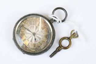 A silver cased ladies fob watch with silvered dial, complete with key.