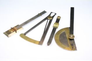 A small collection of antique surveyors / draftsmans tools.