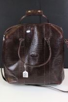 Mulberry brown burgundy alligator skin embossed leather hold all bag. The bag with embossed tree