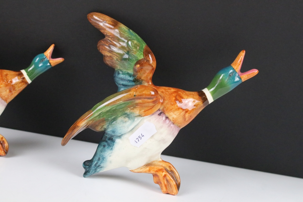 Set of three Beswick ceramic flying duck wall plaques, each having hand painted details. Marked - Image 6 of 13