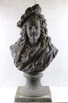 Large patinated metal bust of a cavalier gentleman, raised on a square base. Measures approx 83cm