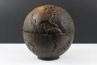 Carved wooden container in the form of a globe, approx 21cm high