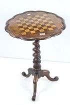 19th century Rosewood Games Table, the circular scallop edge top inlaid with a chess board, raised