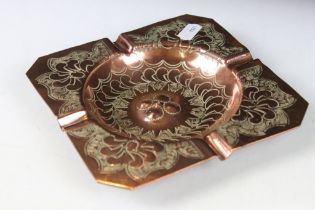 Middle Eastern copper ashtray of square form, with engraved repeating decoration, Arabic signature /