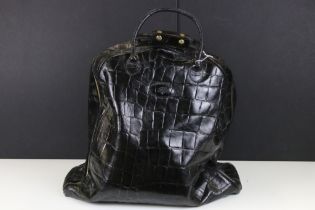 Mulberry black alligator skin embossed holdall weekend bag. The bag having gold tone hardware with