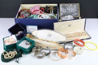 A large collection of vintage and contemporary costume jewellery to include necklaces, rings,