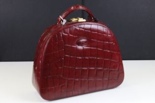 Mulberry 'antique' leathers maroon beauty case bag, constructed from maroon red leather with