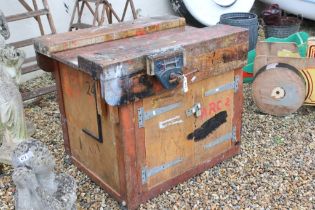 Wooden carpenters workbench, with shelf storage beneath and vice attached. Approx 83cm H 99cm W x