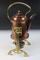 Art Noveau copper spirit kettle, raised on a brass stand, with burner, approx 36cm high