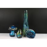 Four pieces of Mdina glass to include a conical paperweight, mushroom paperweight, a tall glass