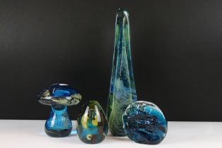 Four pieces of Mdina glass to include a conical paperweight, mushroom paperweight, a tall glass