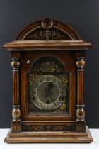 Early 20th century German walnut bracket clock, the brass dial with silvered chapter ring, with