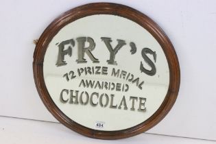 Oak Framed Bevelled Edge Circular Advertising style Wall Mirror marked ' Fry's, 72 Prize Medal