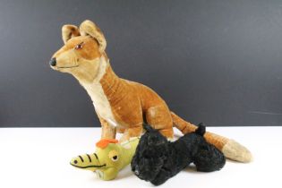 A mid 20th century Merrythought Fox and Scott's Terrier dog together with a Dream Pets crocodile.