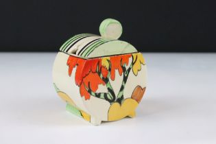 Clarice Cliff Fantasque Newport Pottery sugar dish of round form being hand painted with orange
