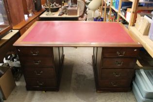 Late Mid century British Rail (Western Region) Partners Desk, the red leather inset top supported by