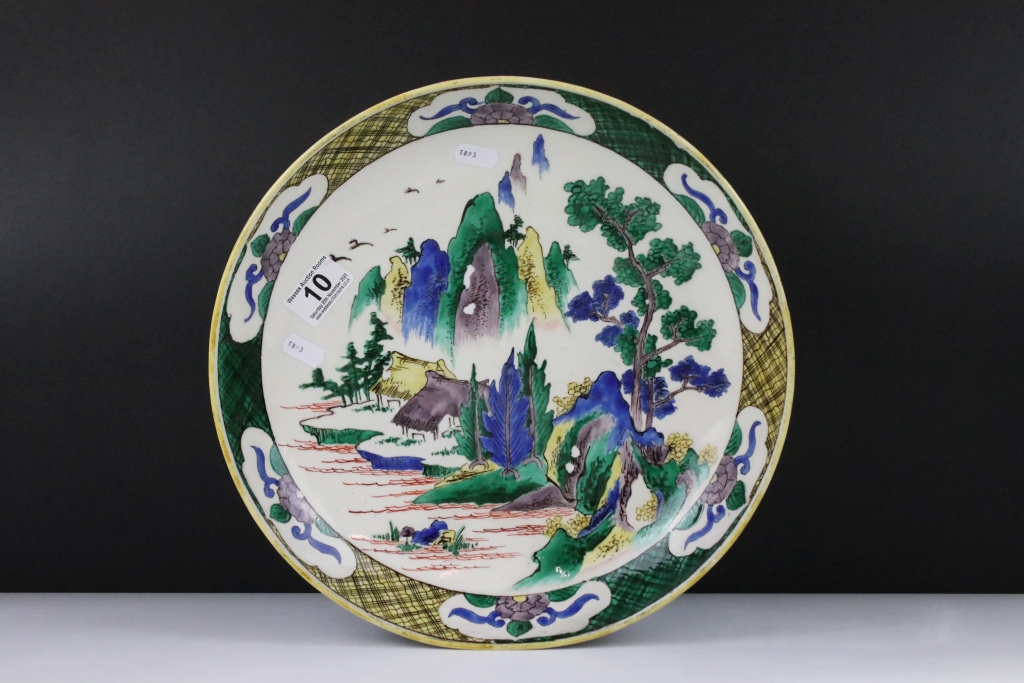 Early 20th Century Japanese Doucai dish / plate of round form. The plate painted with mountain