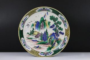 Early 20th Century Japanese Doucai dish / plate of round form. The plate painted with mountain