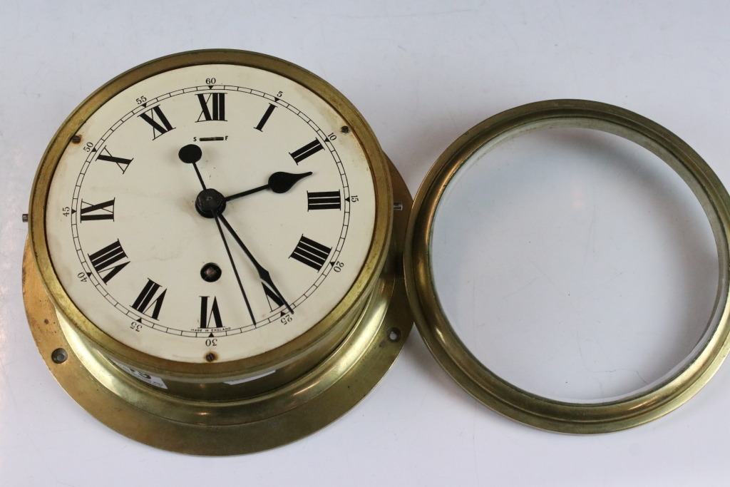 Mid 20th century brass cased ships clock, the cream dial with Roman numerals and poke-style hands, - Image 4 of 5