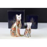 Two Royal Crown Derby porcelain cat paperweights having gold stoppers decorated with Imari type