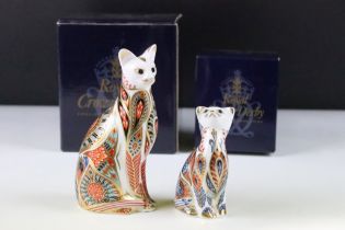 Two Royal Crown Derby porcelain cat paperweights having gold stoppers decorated with Imari type