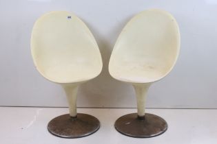 Pair of ‘ Bombo ‘ style White Plastic Swivel Chairs, 50cm wide x 85cm