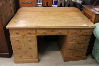 Victorian Pine Twin Pedestal Desk with an arrangement of nine drawers with turned knob handles,