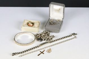 A collection of hallmarked silver and gold jewellery to include necklaces, pendants, bangle and