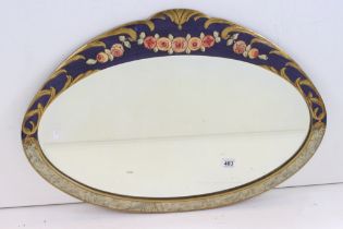 Oval Bevelled edge Wall Mirror, the wooden framed partially painted with a swag of flowers on a blue