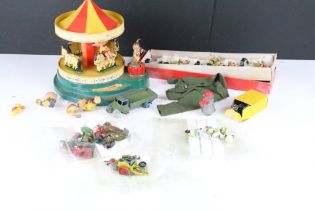 A small collection of vintage toys to include a Corgi Magic Roundabout.