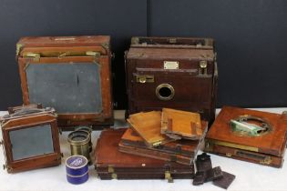 Four late 19th century large format cameras to include a J. Lancaster & Son 'The 1890