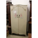 Mid century French style Cream Wardrobe, the two panel doors with applied scroll decoration and hand