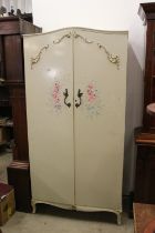 Mid century French style Cream Wardrobe, the two panel doors with applied scroll decoration and hand